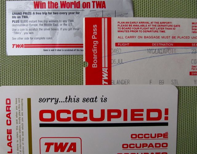 TWA memorabilia: boarding pass and seat-occupied card.