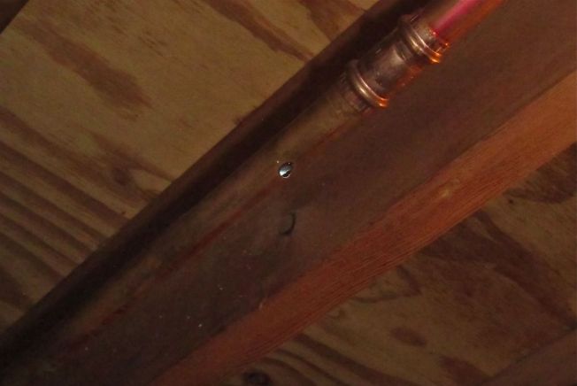 Pinhole leak in copper pipe in my basement.