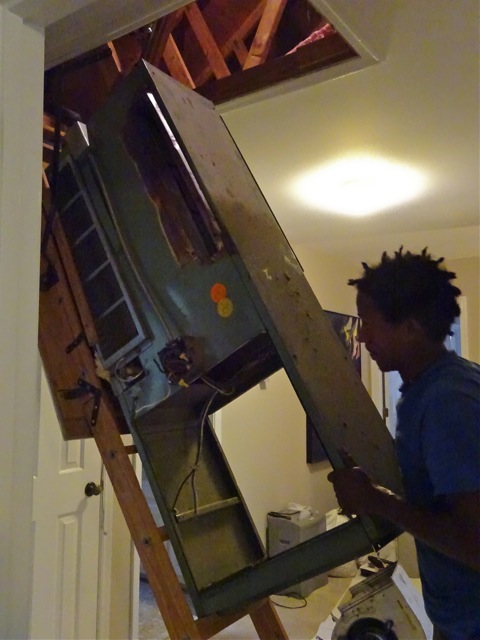 Old Furnace and AC unit come down the attic stair